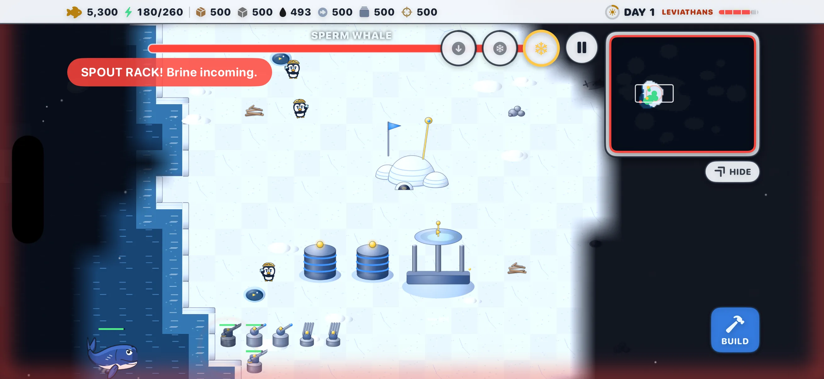 The SPERM WHALE boss bar over a survival colony: a SPOUT RACK warning toast, a whale surfacing in the dark water, and a row of harpoon batteries holding the shore.